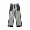 Gray wide-leg pants with black mesh panels at the hips and sheer trim along the legs.