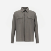 Gray button-up shirt-jacket with two flap chest pockets and a classic collar, long sleeves.