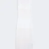 White sleeveless mesh dress with sheer panels and a fitted silhouette.