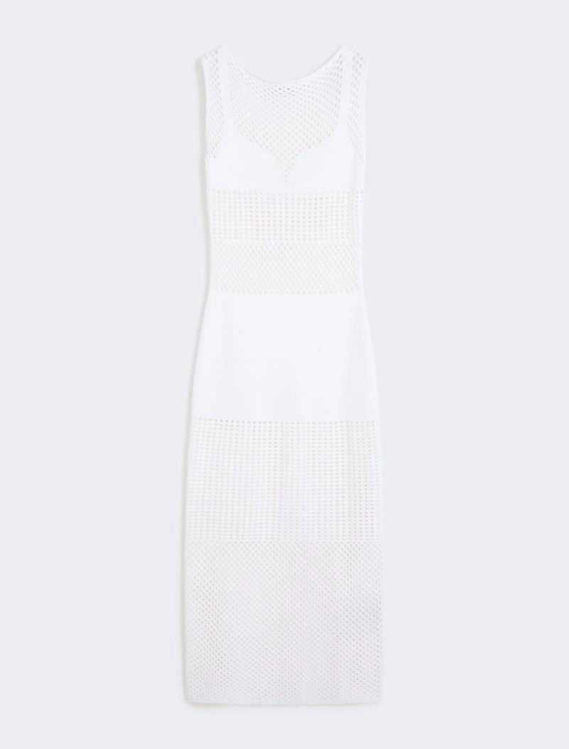 White sleeveless mesh dress with sheer panels and a fitted silhouette.