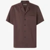 Brown short-sleeve button-down shirt with a single chest pocket and front buttons