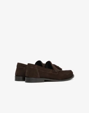 Brown suede loafers with black rubber sole, side view on a white background.