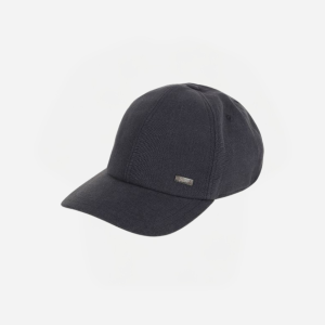 Navy blue baseball cap with a small metal logo on the front panel, isolated on white background.