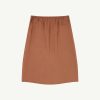 Brown-orange skirt with an elastic waistband visible at the top center of the image