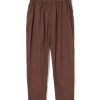 Brown pant with an elastic waistband and relaxed fit, full-length in a warm chocolate color
