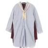 Oversized light blue striped tunic with a cream tie-neck scarf; burgundy lining shows at the sleeves/leaves