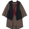 Layered children's outfit: striped brown dress with a black sleeveless vest and a red neckline accent on a plain background.