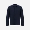 Navy blue long-sleeve button-down shirt with a front chest pocket on a white background.