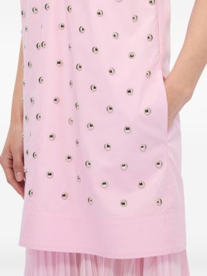 Light pink sleeveless dress with scattered silver studs and a pleated tulle hem.