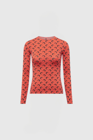 Red long-sleeve top with a repeating black crescent pattern on a mannequin form