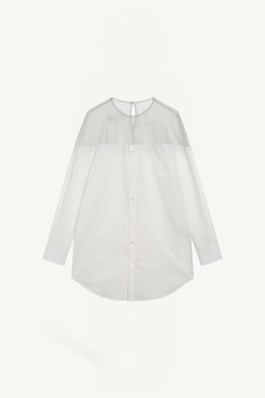 White button-down blouse with a sheer yoke across the shoulders and a chest pocket, long sleeves, rounded hem