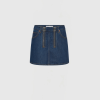 Blue denim mini skirt with centered front zippers and orange stitching, shown from the waist to mid-thigh against a light background.