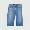 Blue denim knee-length shorts with five-pocket styling and belt loops against a light background.