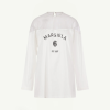 Back view of a white long-sleeve shirt with 'MARGIELA 6 EST 1997' printed in black on the upper back area, minimalist fashion top.