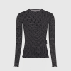 Dark gray long-sleeve shirt with a subtle repeating crescent pattern on a light background, front view.