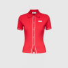 Red polo-style top with a collared neck, white piping along the placket and sleeve cuffs, displayed on a white background.