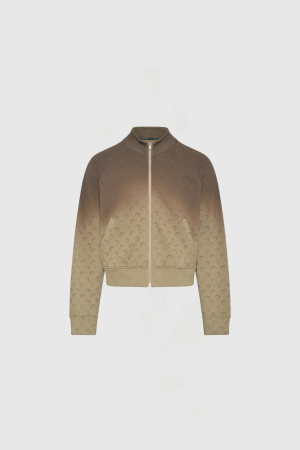 Brown gradient zip-up jacket shown from the front, with a pale zipper, ribbed cuffs, and a subtle repeating pattern across the fabric.