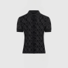 Black short-sleeve button-up blouse with a pointed collar and subtle floral lace pattern, shown from the waist up on a gray background