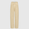 Beige denim jeans with a subtle pattern along the right leg seam, shown from waist to ankles against a pale background.