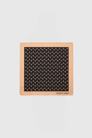 Peach square frame with a black patterned panel of repeating crescent motifs; "MARINE SERRE" logo at bottom-right.